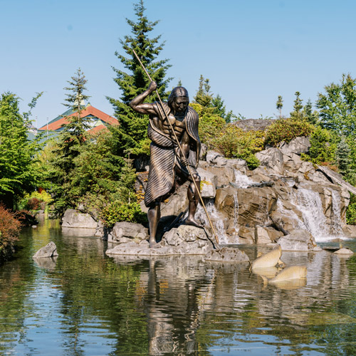 Statue pond at the entrance of Tulalip Resort Casino Quil Ceda Village.